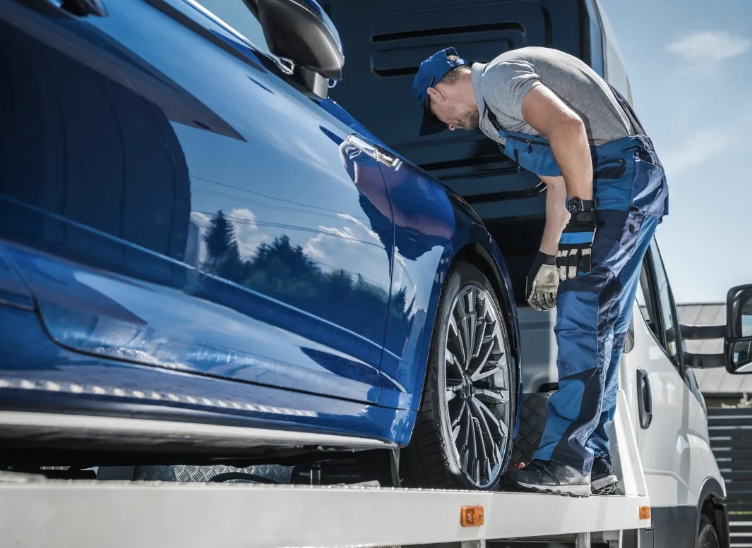 Oshawa local tow truck loading vehicle
