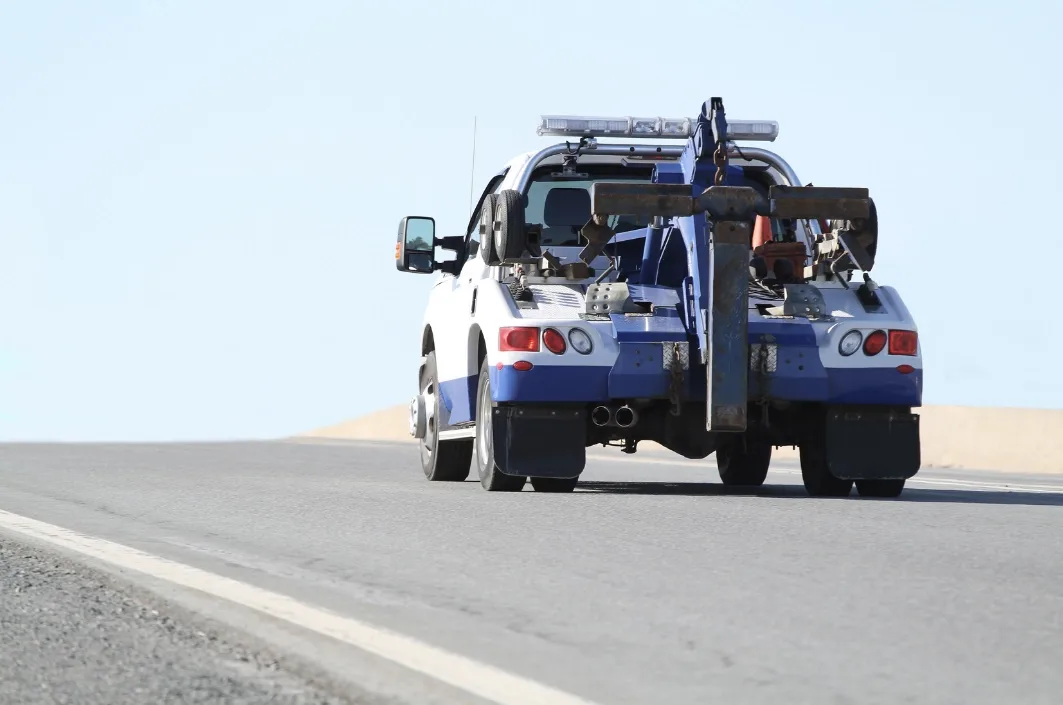 Oshawa wrecker tow truck on the roadside